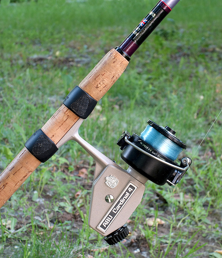abu cardinal 4 in action on a match rod